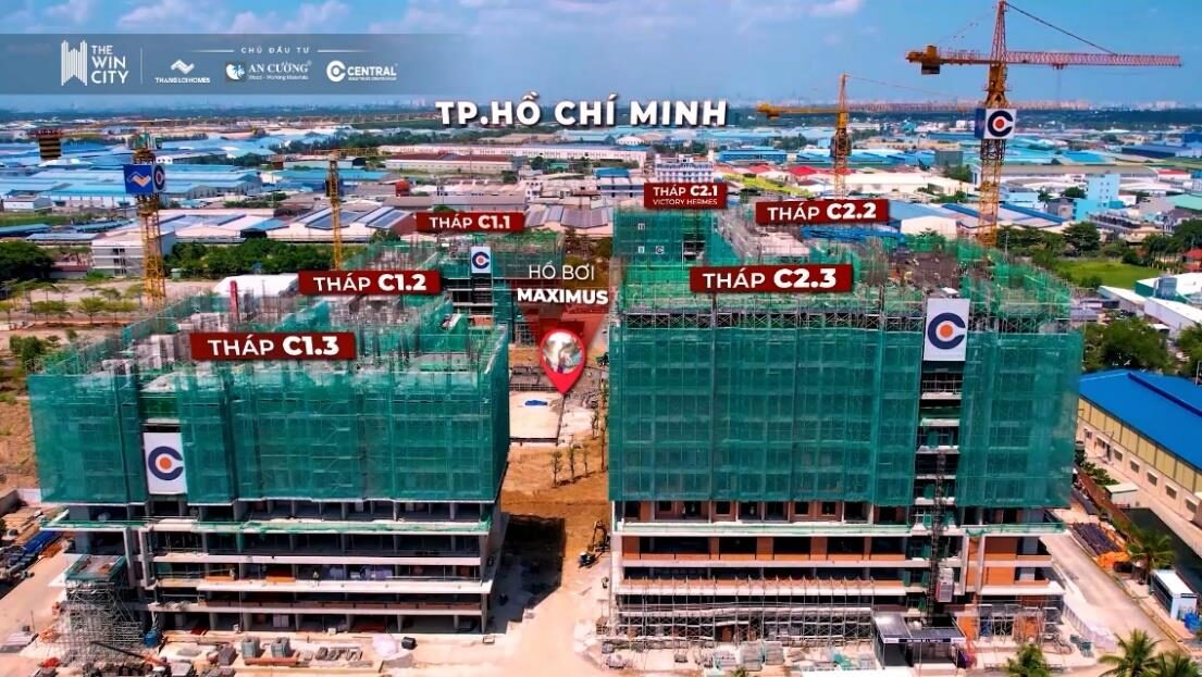 Toàn cảnh cụm tháp C1 và C2 The Win City Đức Hòa nhìn về hướng TP.HCM, tiến độ tháng 8/2026